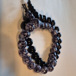 Purple and Black Beaded Bracelet with Smooth Finish